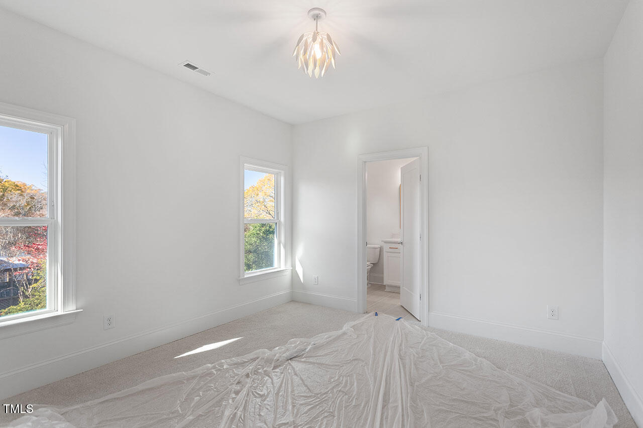 2406 Everett Avenue Raleigh, NC 27607 - Photo 13 of 40 a view of an empty room with a window