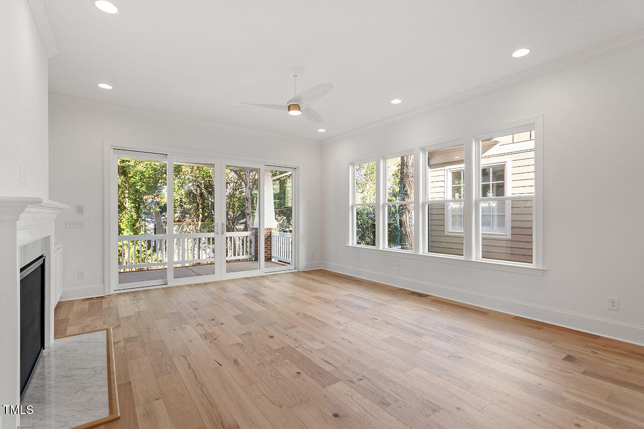 2406 Everett Avenue Raleigh, NC 27607 - Photo 35 of 40 a view of an empty room with wooden floor and a window