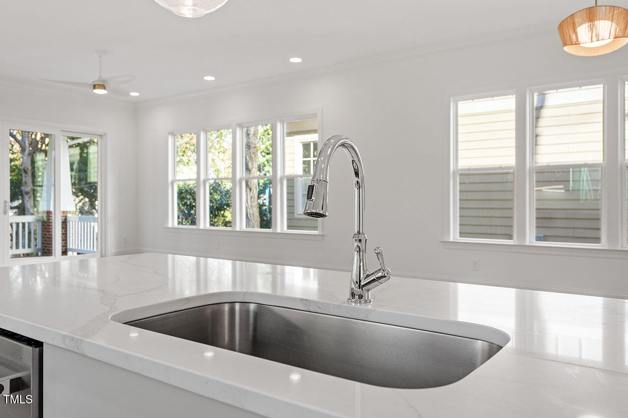 2406 Everett Avenue Raleigh, NC 27607 - Photo 39 of 40 a kitchen with a sink and a large window