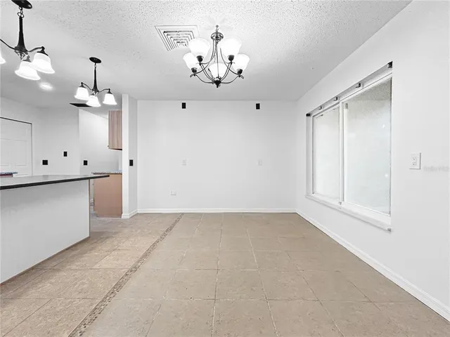 a view of a chandelier in a room