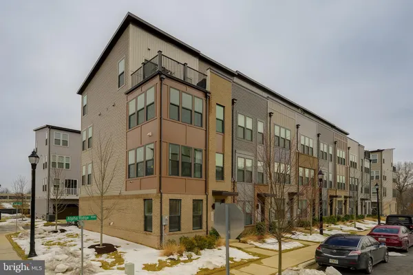 a front view of a building with street view
