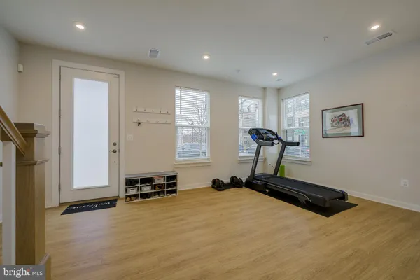 a view of a garage with parked cars