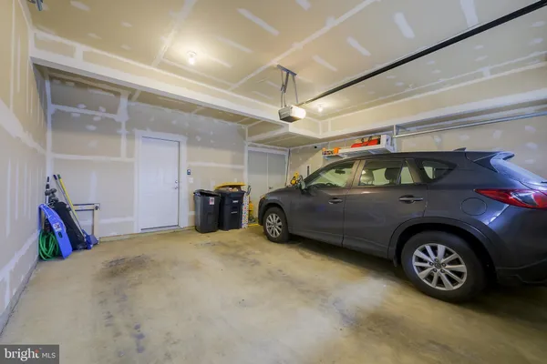 a view of a building with car parked