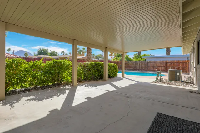 a view of a house with a swimming pool