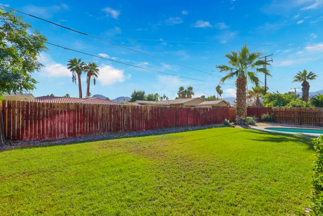 a view of a house with a garden