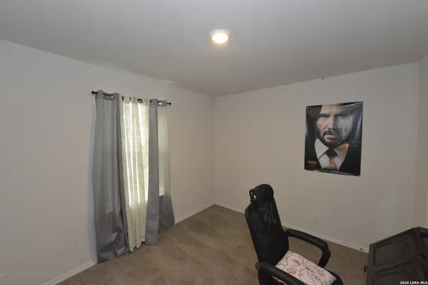 a view of a livingroom with a window