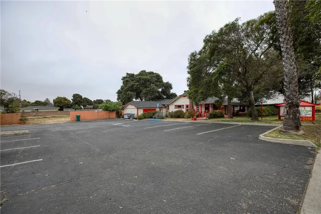 a view of street with parked cars