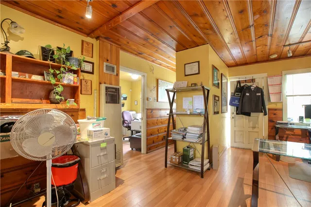a very nice looking living room with wooden floor