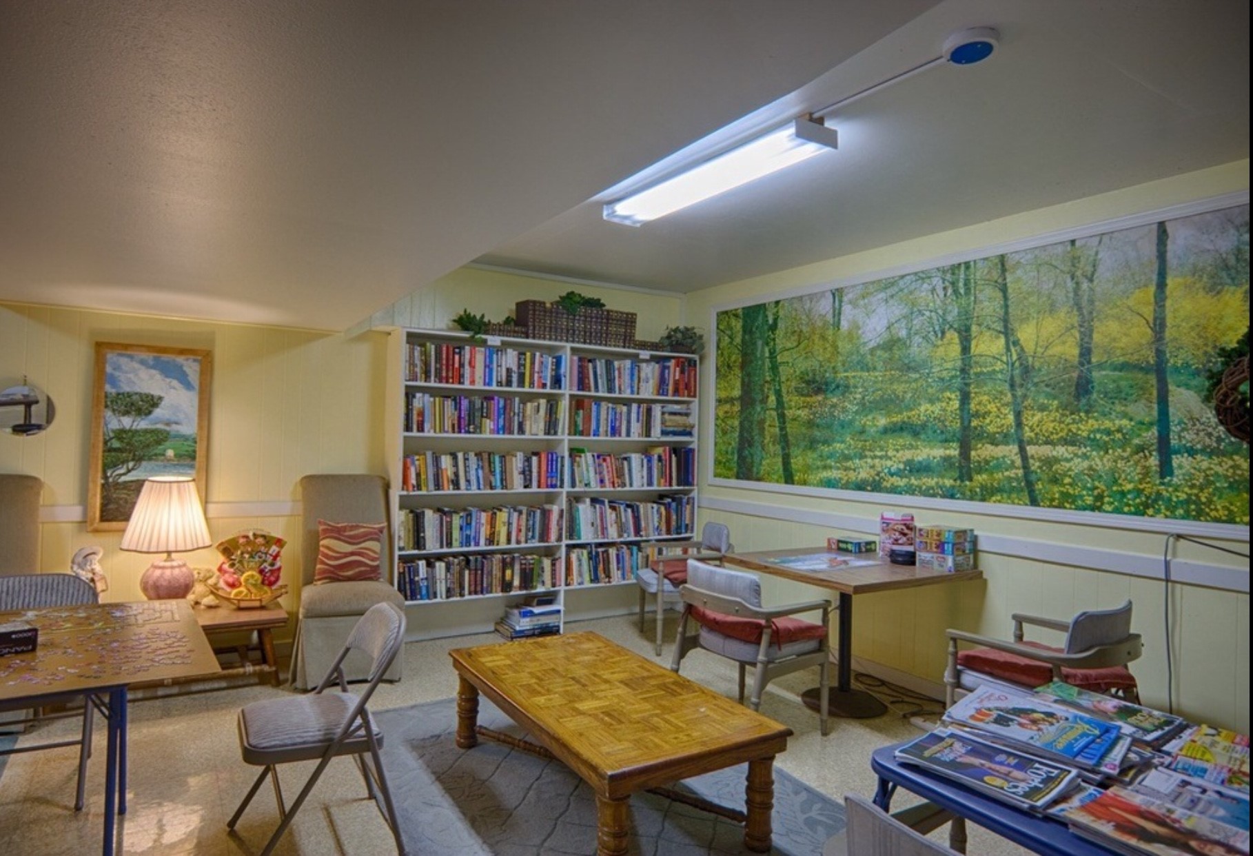 84 Pukihae Street, Unit 804 Hilo, HI 96720 - Photo 15 of 16 a reading room with furniture book shelf and a large window