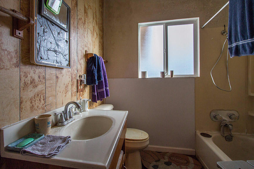 1732 Ash Street Fortuna, CA 95540 - Photo 36 of 37 a bathroom with a sink toilet and mirror