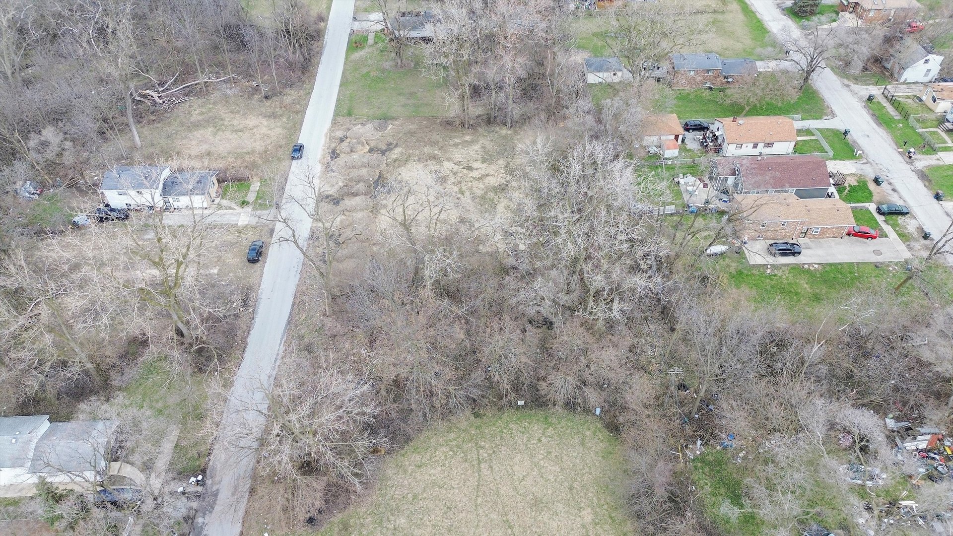 13435 South Lawndale Avenue Robbins, IL 60472 - Photo 5 of 16 a aerial view of a house with a yard