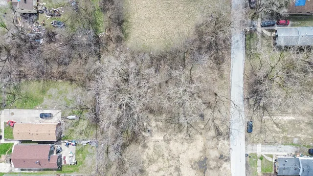 a view of a bathroom with a sink and a yard