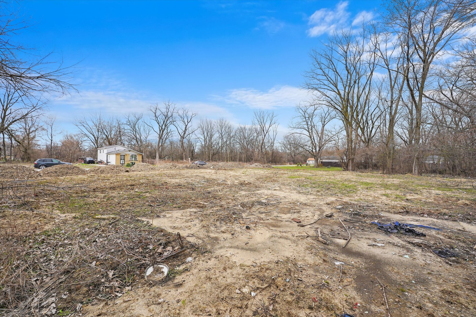 13435 South Lawndale Avenue Robbins, IL 60472 - Photo 10 of 16 a view of dirt field with trees