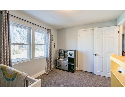 1 Dickie Road Woburn, MA 01801 - Photo 14 of 22 a living room with furniture and a window