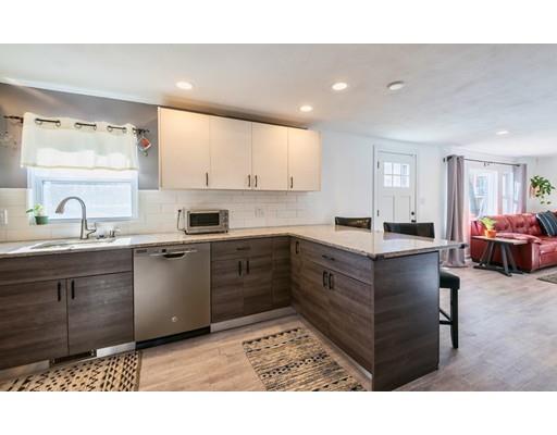 1 Dickie Road Woburn, MA 01801 - Photo 2 of 22 a kitchen with sink cabinets and window