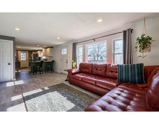 1 Dickie Road Woburn, MA 01801 - Photo 8 of 22 a living room with furniture and a large window