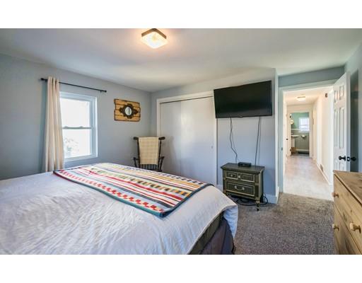 1 Dickie Road Woburn, MA 01801 - Photo 10 of 22 a bedroom with a bed and a dresser