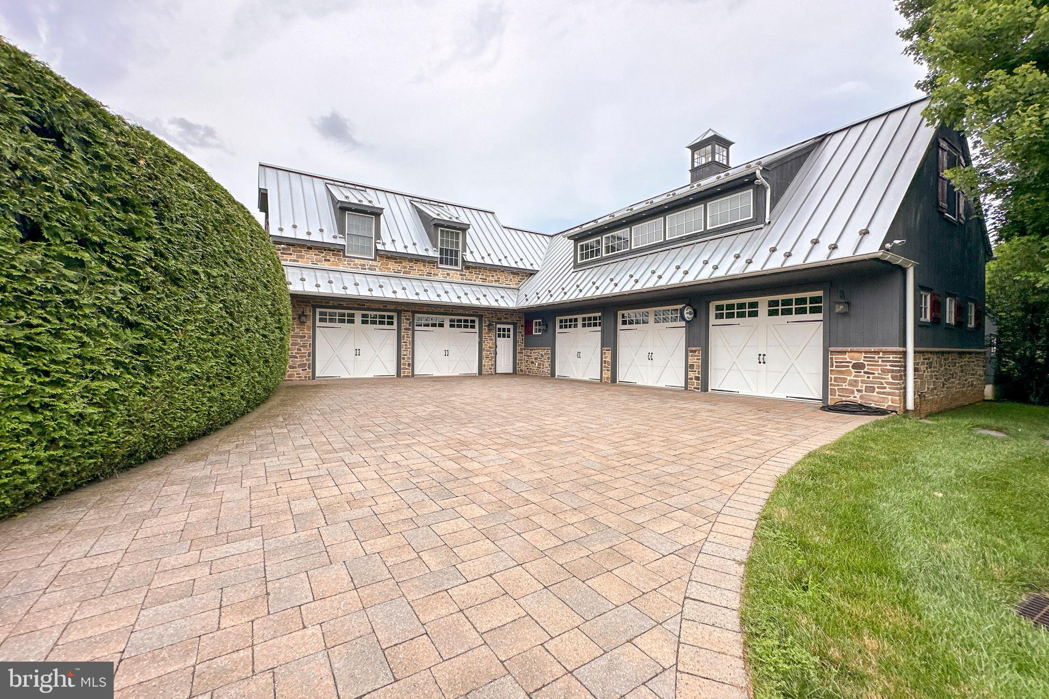 6997 Phillips Mill Road New Hope, PA 18938 - Photo 13 of 85 a front view of a house with a garden