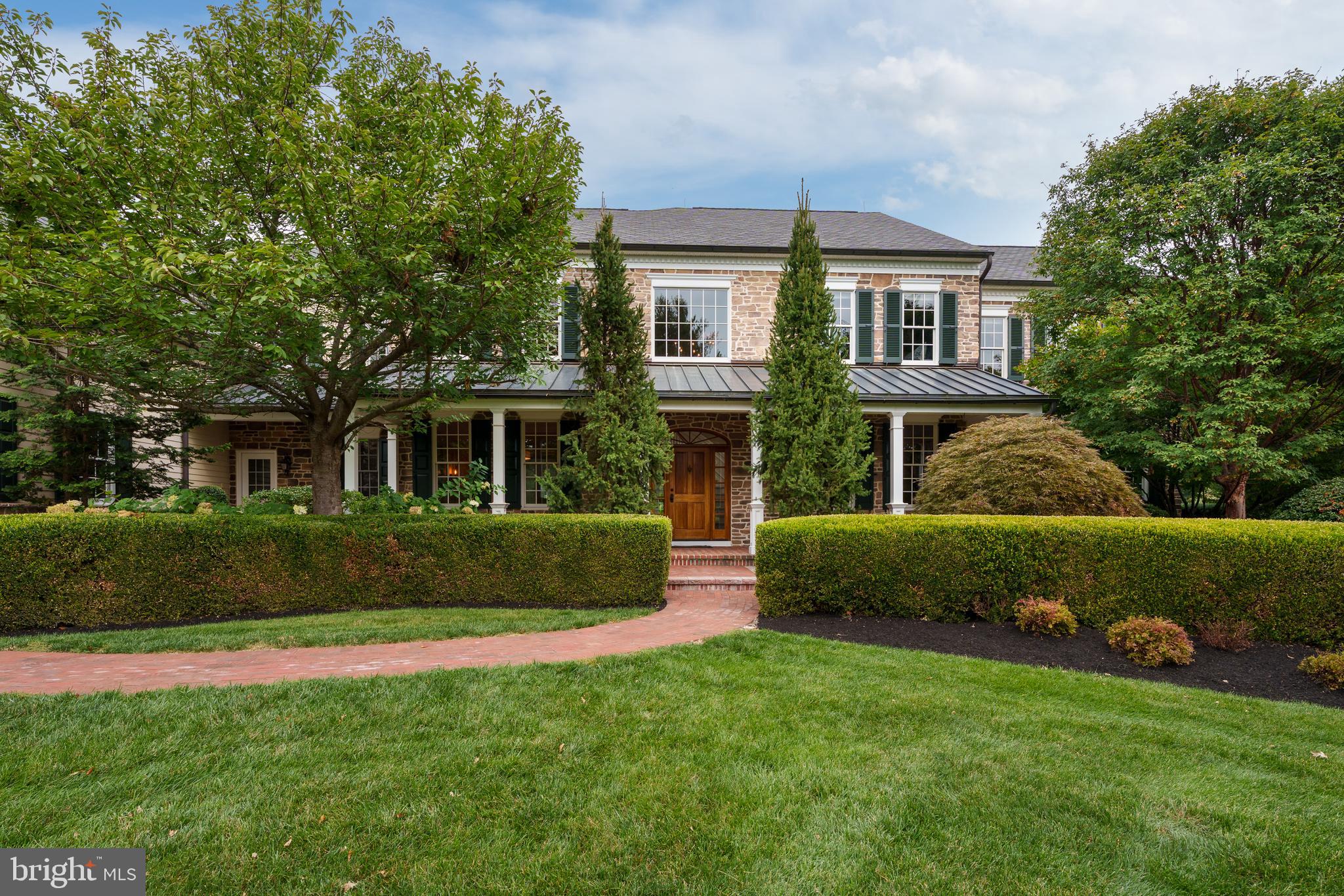6997 Phillips Mill Road New Hope, PA 18938 - Photo 2 of 85 a front view of a house with a yard