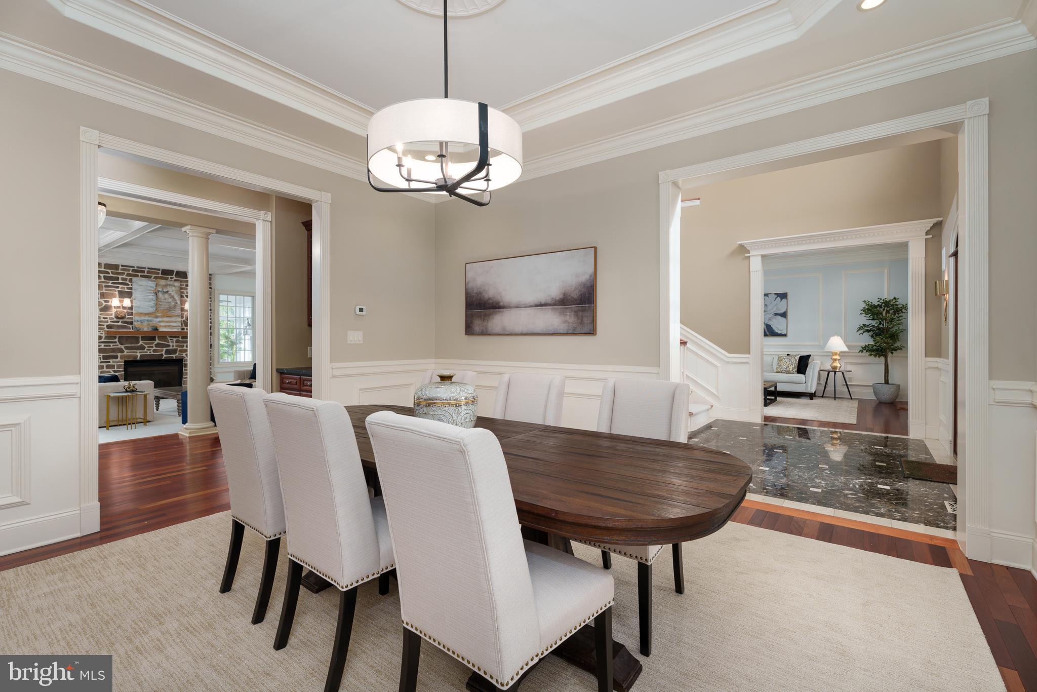 6997 Phillips Mill Road New Hope, PA 18938 - Photo 23 of 85 a view of a dining room with furniture and wooden floor