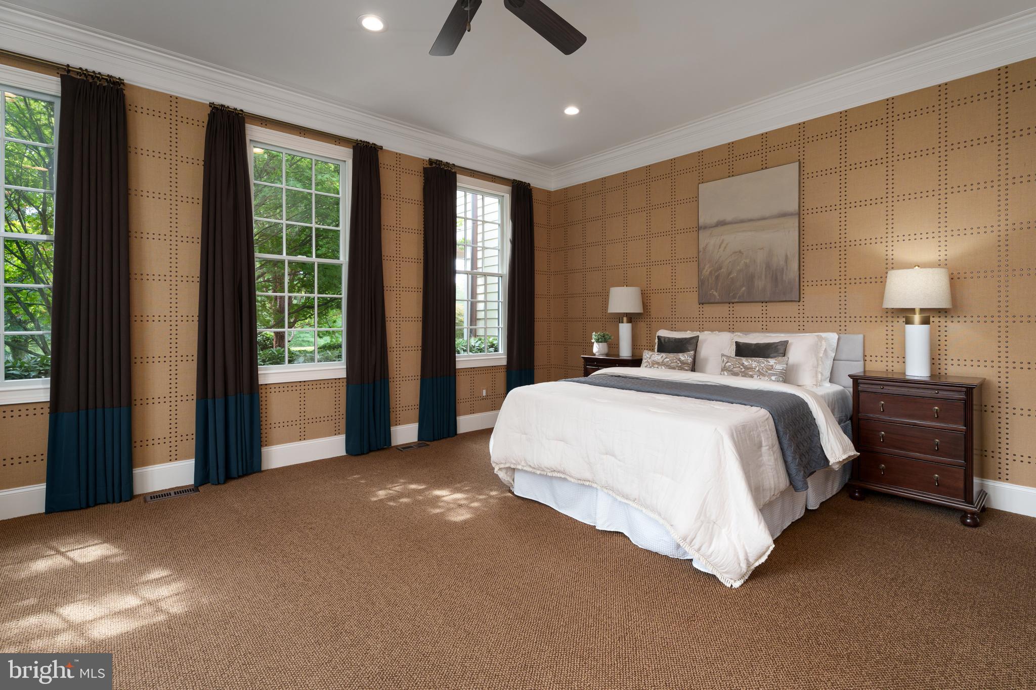 6997 Phillips Mill Road New Hope, PA 18938 - Photo 40 of 85 a bedroom with a large bed and a large window