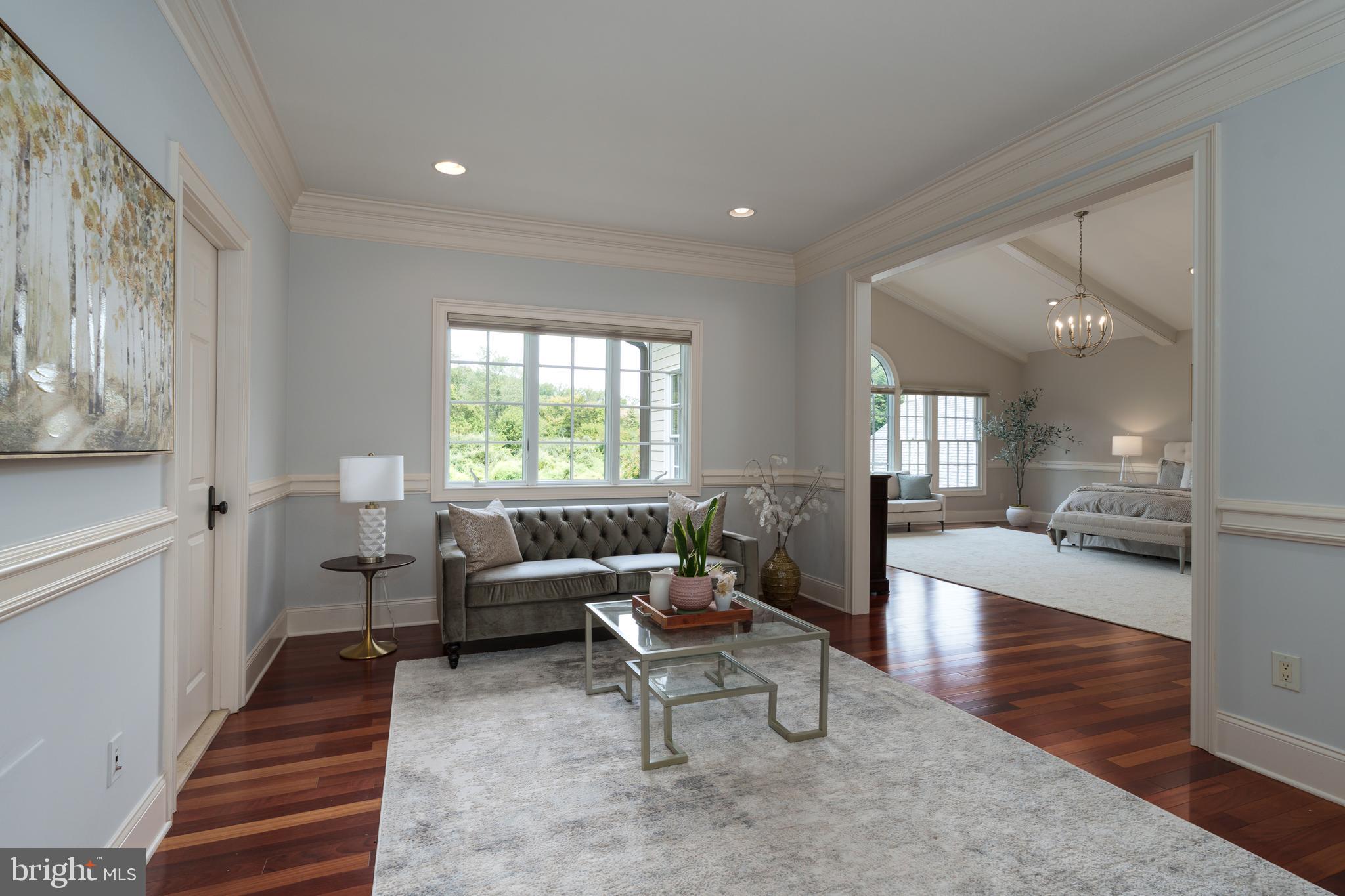 6997 Phillips Mill Road New Hope, PA 18938 - Photo 46 of 85 a living room with furniture and a wooden floor