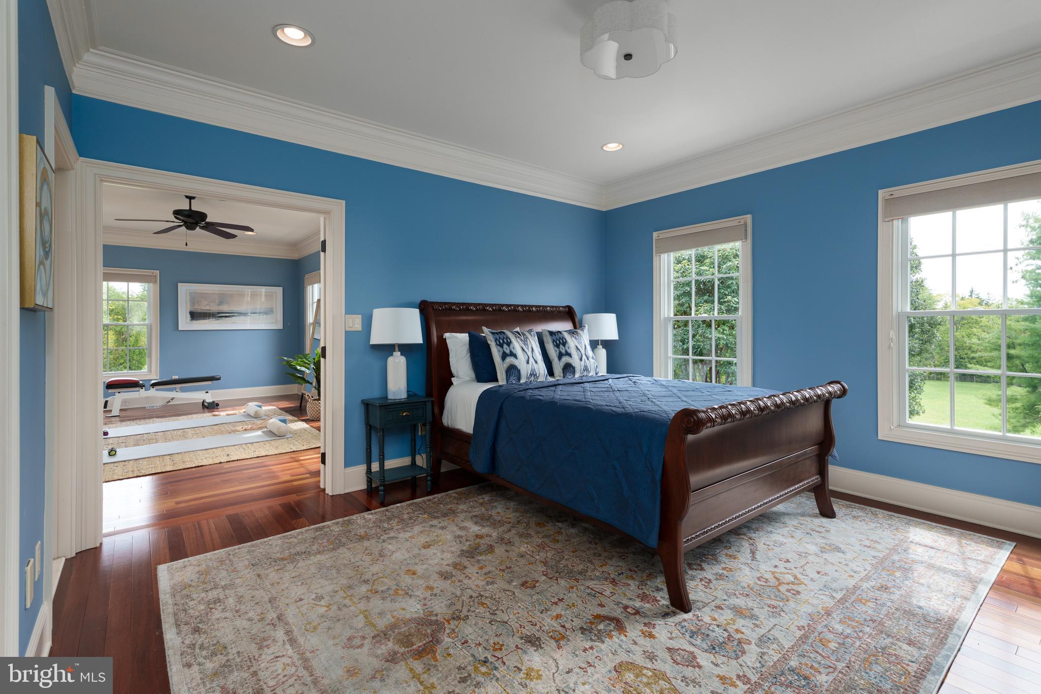 6997 Phillips Mill Road New Hope, PA 18938 - Photo 52 of 85 a bedroom with a bed and a large window with outer view
