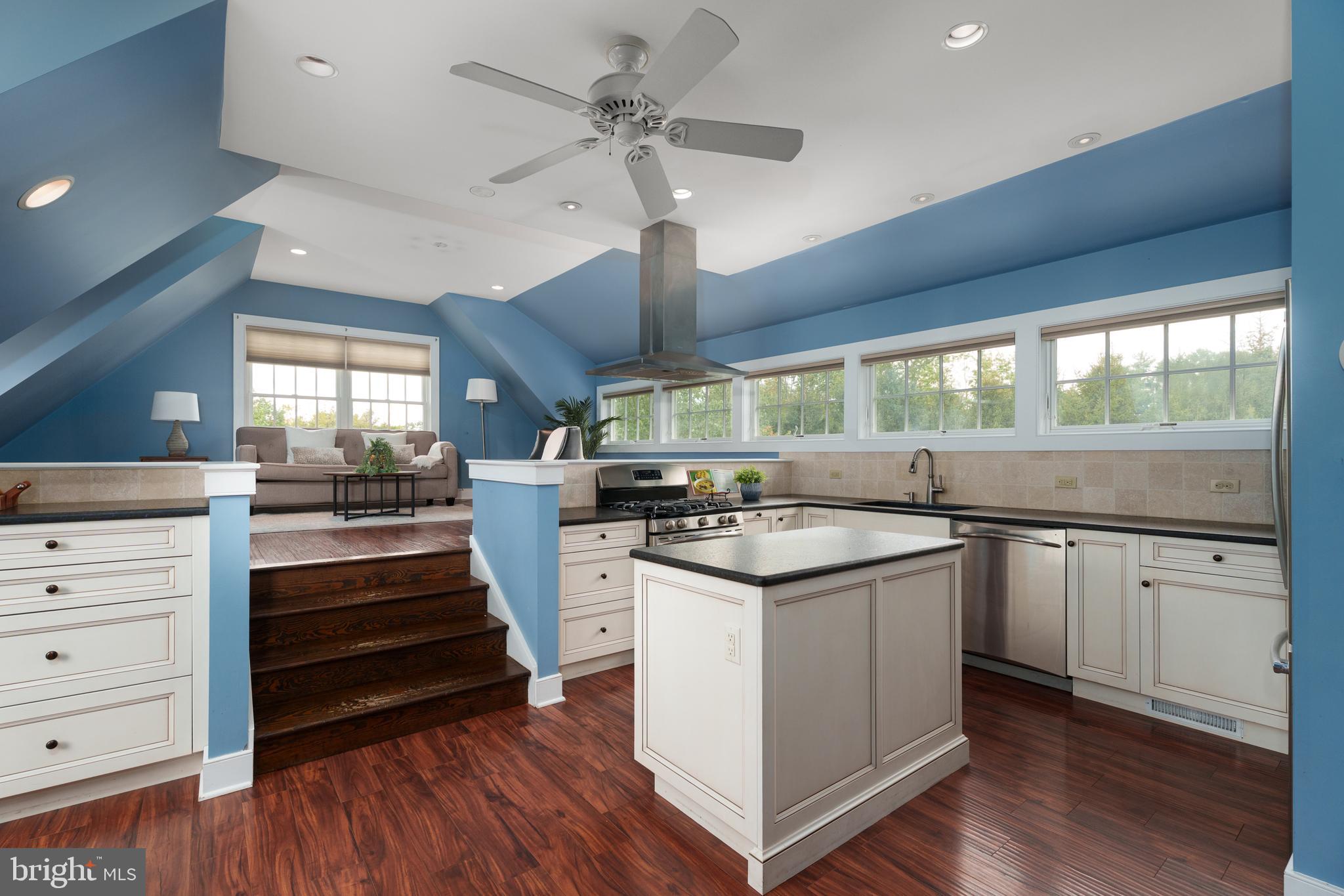 6997 Phillips Mill Road New Hope, PA 18938 - Photo 58 of 85 a kitchen with granite countertop cabinets stainless steel appliances and a large window