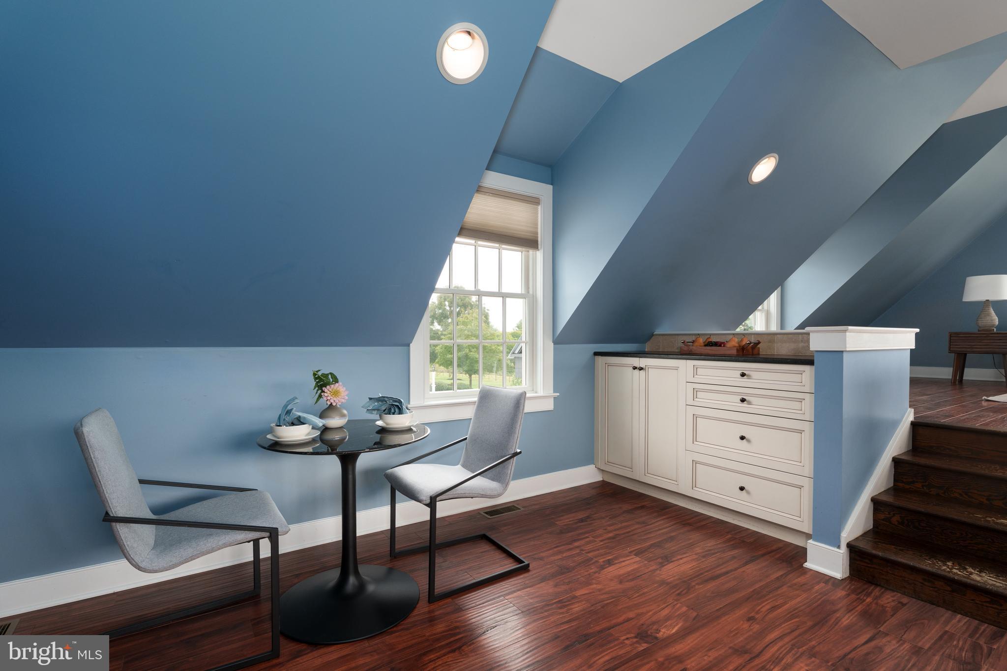 6997 Phillips Mill Road New Hope, PA 18938 - Photo 59 of 85 a living room with furniture and wooden floor