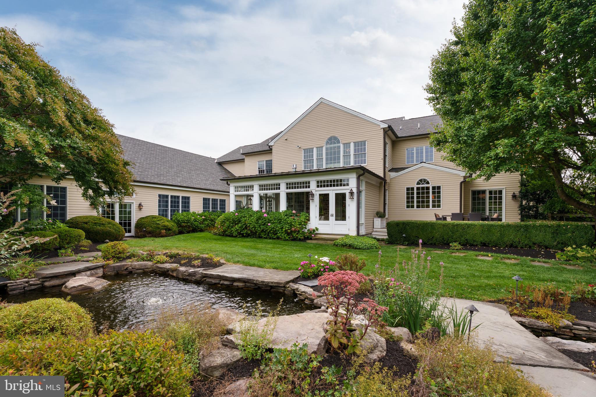6997 Phillips Mill Road New Hope, PA 18938 - Photo 70 of 85 a front view of a house with a yard