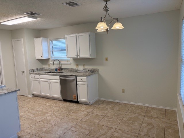 12715 Modena Trail Austin, TX 78729 - Photo 3 of 16 Kitchen and breakfast area
