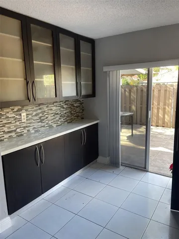 a bathroom with a double vanity sink and mirror
