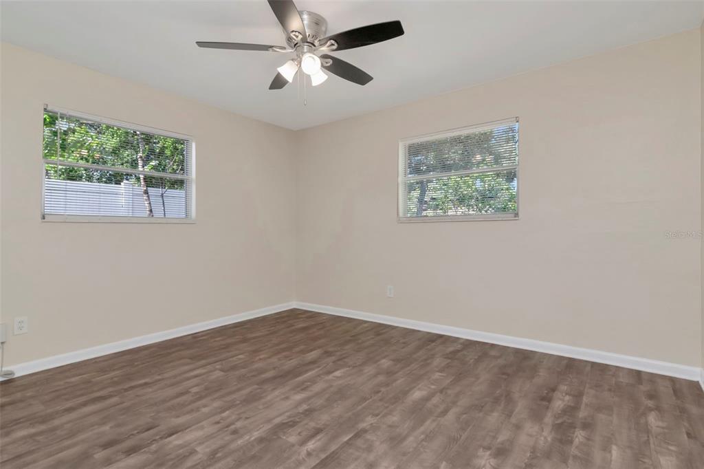 126 Kingsway Road Brandon, FL 33510 - Photo 27 of 42 a view of empty room with wooden floor