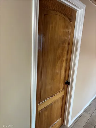 a bathroom with a glass door