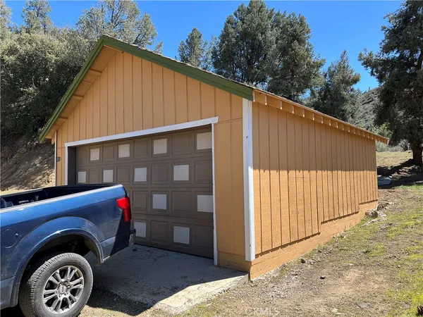 a view of a house with a garage