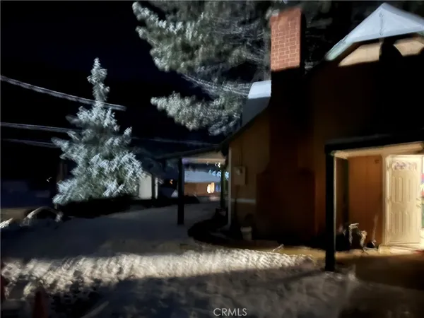 a view of house with yard