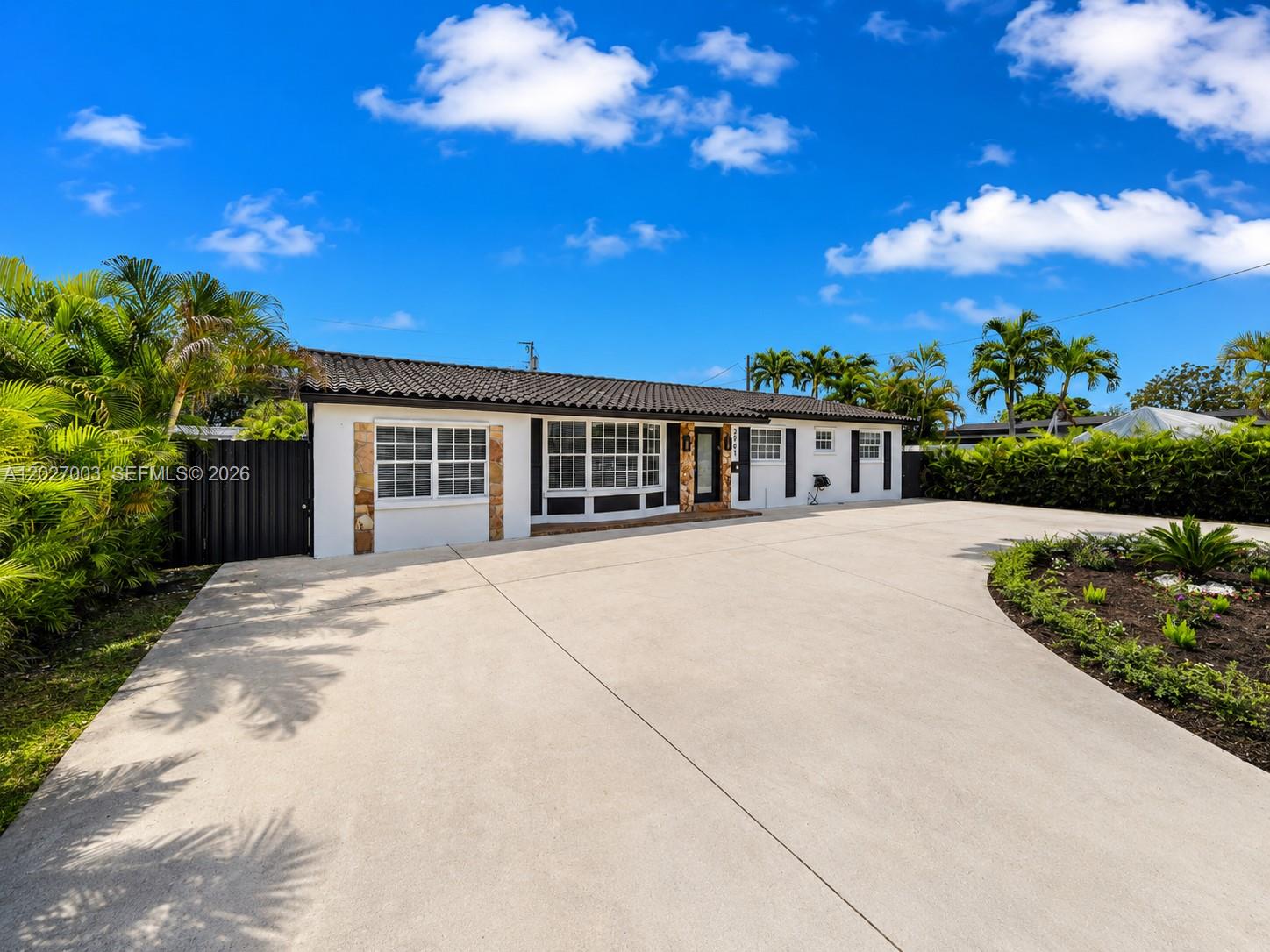 2761 Southwest 92nd Place Miami, FL 33165 - Photo 26 of 37 a view of a house with a patio