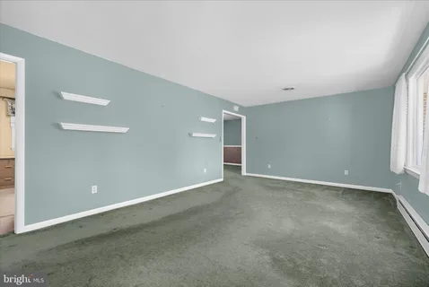 a view of a livingroom with a fireplace