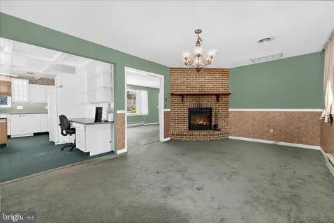 a view of a livingroom with a fireplace