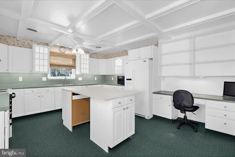 a bedroom with a bed and a walk in closet