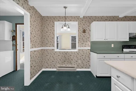 a view of storage and utility room