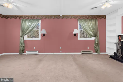 a house with trees in the background