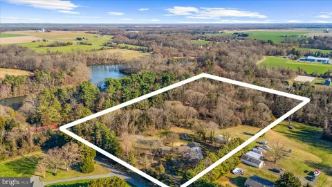 a work room with furniture and a window