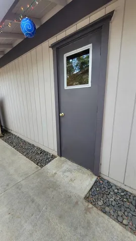 a bedroom with a bed and cabinets