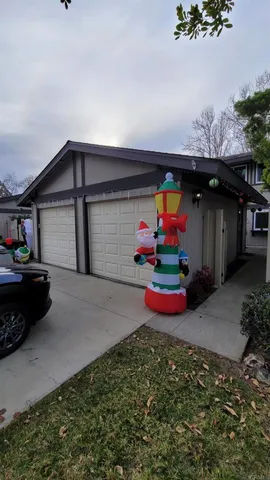 a view of outdoor space and front view of a house