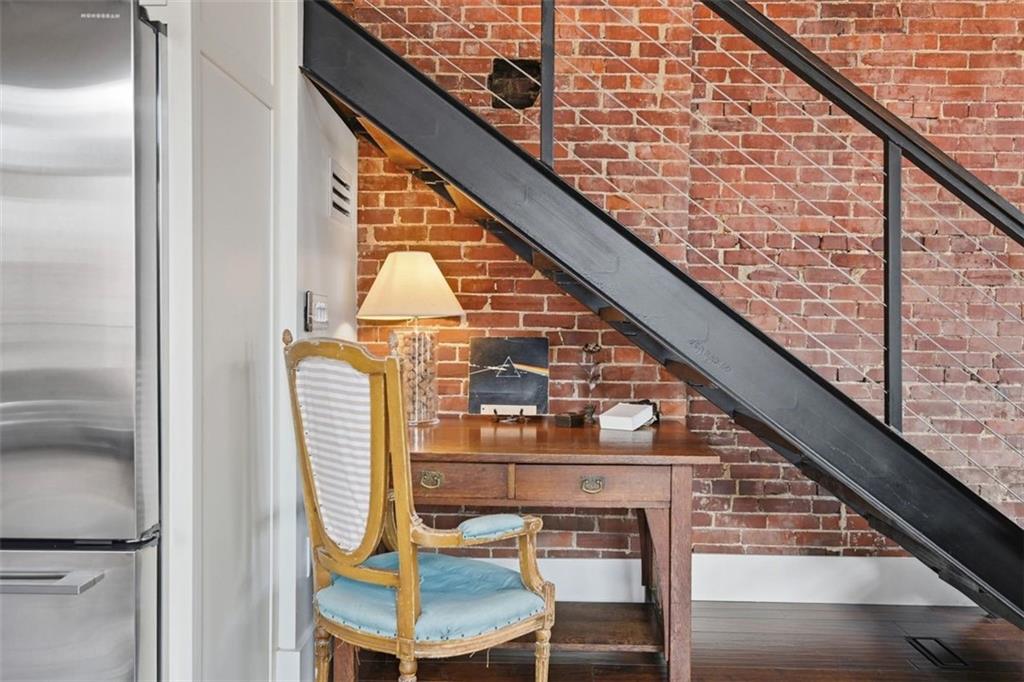 443 Walnut Street Sewickley, PA 15143 - Photo 19 of 50 A tucked-away desk nook beneath the stair creates a smart space for work, study, or household organization.