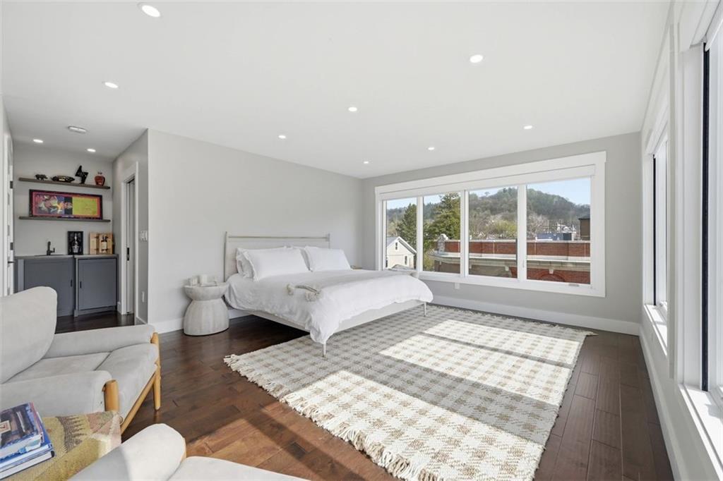 443 Walnut Street Sewickley, PA 15143 - Photo 27 of 50 Generous proportions make the primary suite feel calm, airy, and distinctly separate from the rest of the home