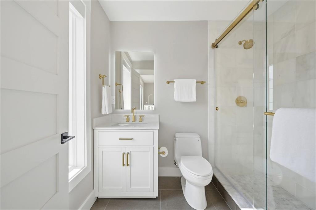 443 Walnut Street Sewickley, PA 15143 - Photo 35 of 50 A beautifully finished full bath serves the secondary bedroom with the same polished feel found throughout the home. Enjoy hardwired backlit anti-fog mirrors throughout.