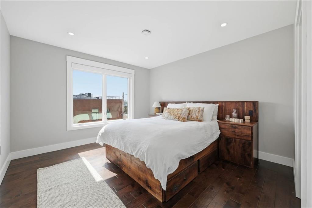 443 Walnut Street Sewickley, PA 15143 - Photo 36 of 50 Another bedroom offers warmth, natural light, and a comfortable sense of privacy on the upper floor as well as a walk-in closet.