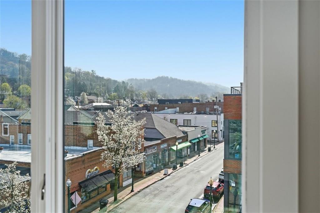 443 Walnut Street Sewickley, PA 15143 - Photo 4 of 50 From the primary suite, the outlook over Sewickley Village gives the room a uniquely connected sense of place. Just beyond the front door, a vibrant community unfolds.